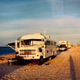 Image for article titled This 4x4 Lifted School Bus Can Camp Anywhere